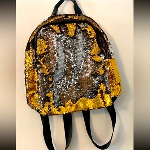 Backpack with reverse sequins